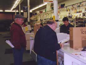 Joe-M8MUM, Bruce-WA8PGD, and the salesmen